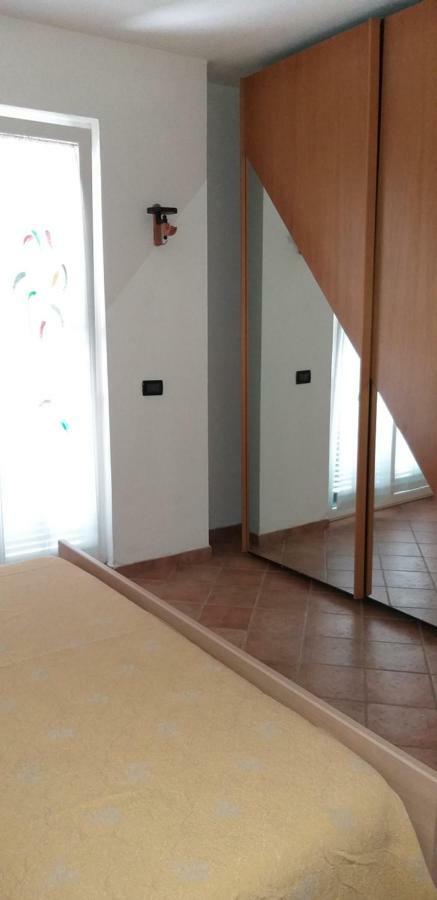 Appartamento Terrazza Vista Mare Mozzafiato โมเนเลีย ภายนอก รูปภาพ